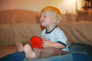 little boy enjoying a childrens book